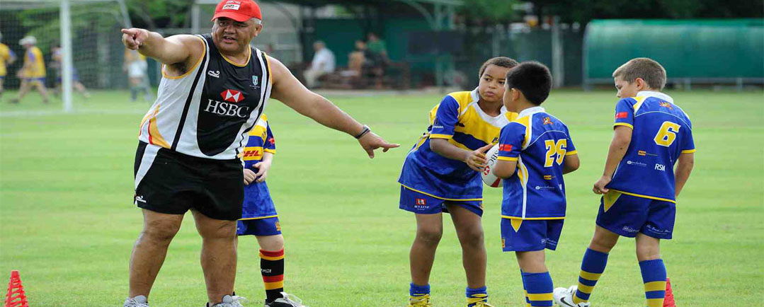 Junior sports team huddle